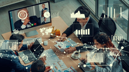 Creative visual of business people in a corporate staff meeting on video call . Concept of digital...