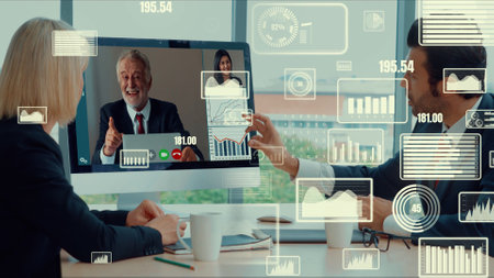 Creative visual of business people in a corporate staff meeting on video call . Concept of digital technology for marketing data analysis and investment decision making .の写真素材