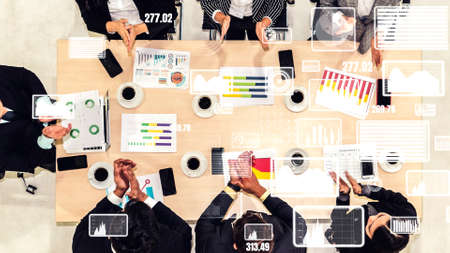 Creative visual of business people in the corporate staff meeting . Concept of digital technology for marketing data analysis and investment decision making .の写真素材
