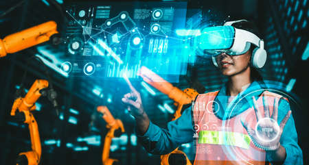 Advanced robot arm system for digital industry and factory robotic technology . Automation manufacturing robot controlled by industry engineering using IOT software connected to internet network .の写真素材