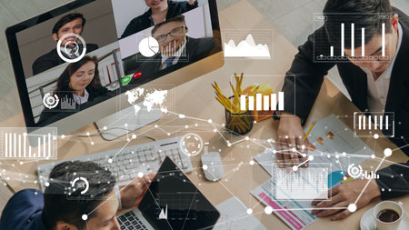Creative visual of business people in a corporate staff meeting on video call . Concept of digital technology for marketing data analysis and investment decision making .の写真素材