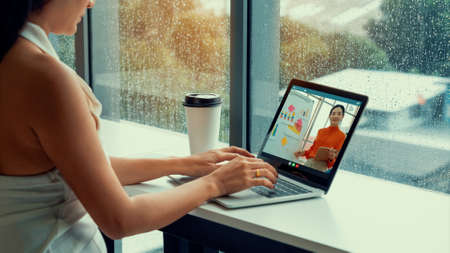 E-learning and Online Business Presentation Meeting Concept. Digital training course for people to do remote learning from anywhere.の写真素材