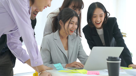 Business people celebrate success of proficiently finished project . Corporate business team collaboration concept .の写真素材