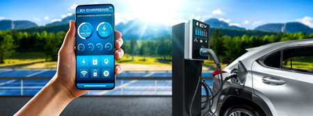 EV charging station for electric car with mobile app display charger status . The electric power is...