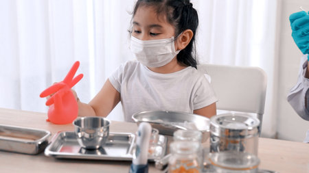 School girl visits skillful doctor at hospital for vaccination .