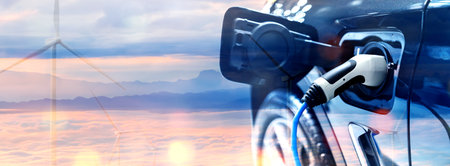 EV charging station for electric car in concept of green energy and eco power produced from sustainable source to supply to charger station in order to reduce CO2 emission .の写真素材