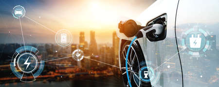 EV charging station for electric car in concept of alternative green energy produced from sustainable resources to supply to charger station in order to reduce CO2 emission .の写真素材