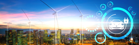 Electric car in concept of green sustainable energy used by EV charging station produced from renewable resources to supply to charger station in order to reduce CO2 emission .の写真素材