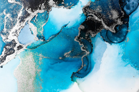 Blue silver abstract background of marble liquid ink art painting on paper . Image of original artwork watercolor alcohol ink paint on high quality paper texture .の写真素材