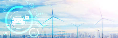 Electric car in concept of green sustainable energy used by EV charging station produced from renewable resources to supply to charger station in order to reduce CO2 emission .の写真素材