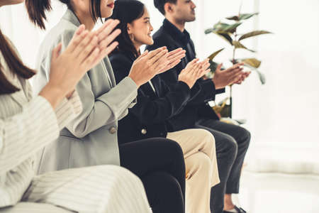 Businesswoman proficiently present work project receive celebrations from team . Corporate business team collaboration concept .の写真素材