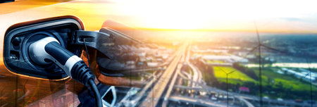 EV charging station for electric car in concept of green energy and eco power produced from sustainable source to supply to charger station in order to reduce CO2 emission .の写真素材