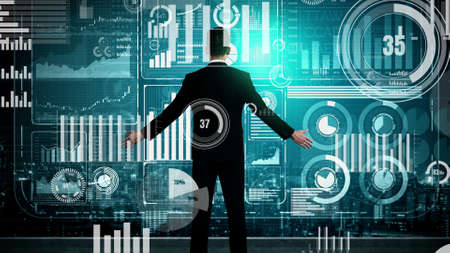 Big Data Technology for Business Finance Analytic conceptual. Modern graphic interface shows massive information of business sale report, profit chart and stock market analysis on screen monitor.の写真素材
