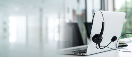 Headset and customer support equipment at call center ready for actively service . Corporate business help desk and telephone assistance concept .の写真素材