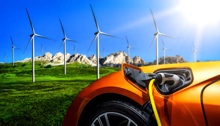 EV charging station for electric car in concept of green sustainable energy produced from renewable resources to supply to charger station in order to reduce CO2 emission .の写真素材