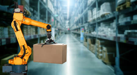 Smart robot arm system for innovative warehouse and factory digital technology . Automation manufacturing robot controlled by industry engineering using IOT software connected to internet network .の写真素材