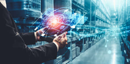 Smart warehouse management system with innovative internet of things technology to identify package picking and delivery . Future concept of supply chain and logistic network business .の写真素材