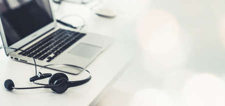 Headset and customer support equipment at call center ready for actively service . Corporate business help desk and telephone assistance concept .の写真素材