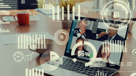 Creative visual of business people in a corporate staff meeting on video call . Concept of digital technology for marketing data analysis and investment decision making .の写真素材