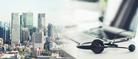 Headset and customer support equipment at call center ready for actively service . Corporate...
