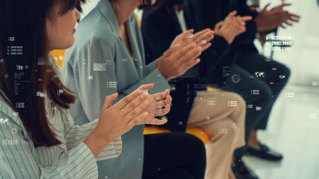 Envisional graphic on business people celebrating in corporate staff meeting . Concept of digital technology for marketing data analysis and investment decision making .の写真素材