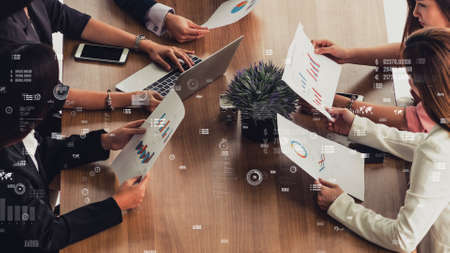 Conceptual vision of business people in corporate staff meeting . Concept of digital technology for marketing data analysis and investment decision making .の写真素材
