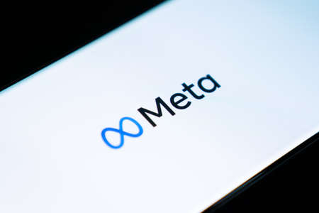 Bangkok, Thailand - October 29, 2021: Meta logo is shown on a device screen. Meta is the new corporate name of Facebook. Social media platform will change to Meta to emphasize its metaverse vision.のeditorial素材