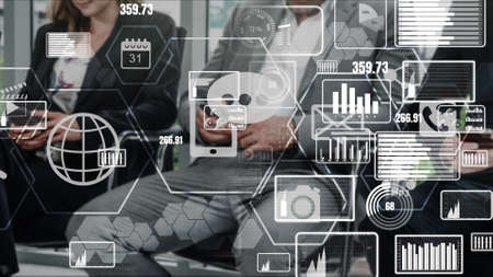 Multimedia and Computer Applications conceptual . Business people using technology of digital gadget with modern graphic interface showing social, shopping, and multimedia application on device.の写真素材