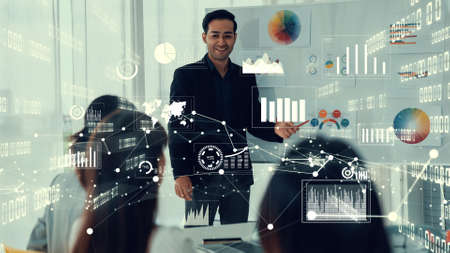 Business people in corporate staff meeting with envisional graphic . Concept of digital technology for marketing data analysis and investment decision making .の写真素材