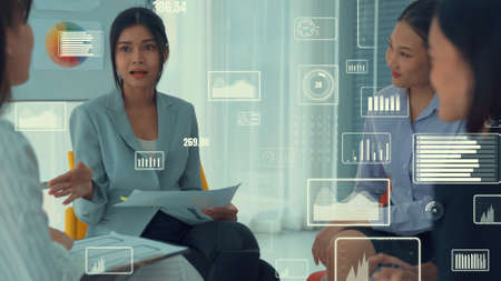 Business people in corporate staff meeting with envisional graphic . Concept of digital technology for marketing data analysis and investment decision making .の写真素材