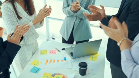 Businesswoman proficiently present work project receive celebrations from team . Corporate business...