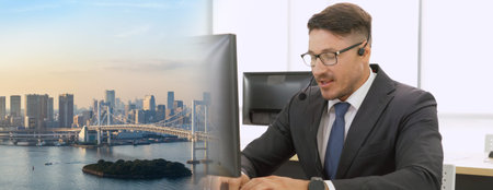 Business people wearing headset working in office to support remote customer or colleague. Call...