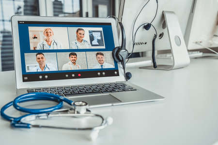 Telemedicine service online video call for doctor to actively chat with patient via remote healthcare consultant software . People can use app to contact doctors for virtual meeting from home .の写真素材