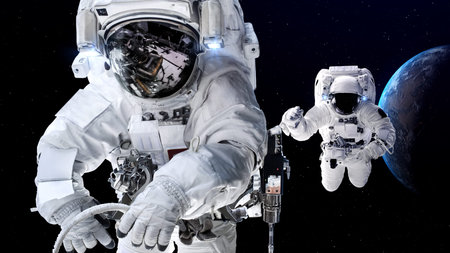 Astronaut spaceman do spacewalk while working for spaceflight mission at space station . Astronaut...