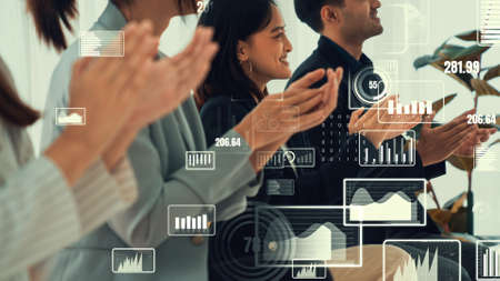 Envisional graphic on business people celebrating in corporate staff meeting . Concept of digital technology for marketing data analysis and investment decision making .の写真素材