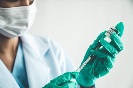 Skillful doctor prepare vaccine proficiently before injection . Covid 19 and coronavirus vaccination...