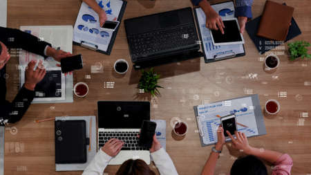 Conceptual vision of business people in the corporate staff meeting . Concept of digital technology for marketing data analysis and investment decision making .の写真素材