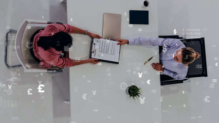 Conceptual vision of business people in corporate staff meeting . Concept of digital technology for marketing data analysis and investment decision making .の写真素材