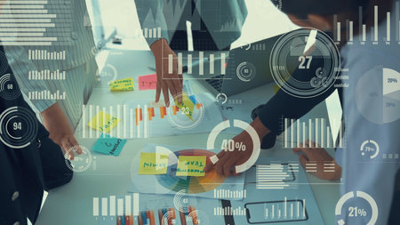 Business people in corporate staff meeting with envisional graphic . Concept of digital technology for marketing data analysis and investment decision making .の写真素材