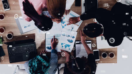 Conceptual vision of business people in the corporate staff meeting . Concept of digital technology for marketing data analysis and investment decision making .の写真素材