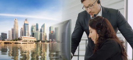 Business people wearing headset working in office to support remote customer or colleague. Call...