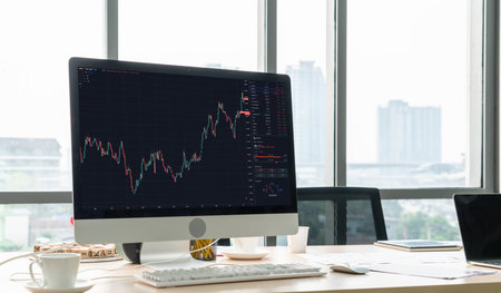 Stock market data chart analysis by ingenious computer software . Investment application display...