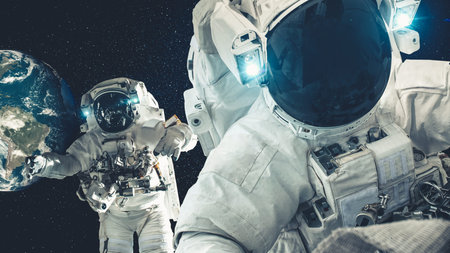 Astronaut spaceman do spacewalk while working for spaceflight mission at space station . Astronaut...