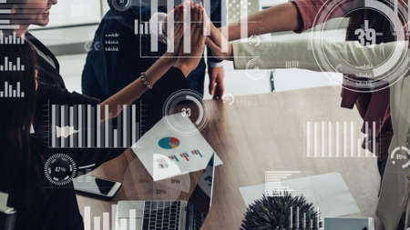 Conceptual vision of business people in the corporate staff meeting . Concept of digital technology for marketing data analysis and investment decision making .の写真素材