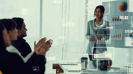 Business people in corporate staff meeting with envisional graphic . Concept of digital technology for marketing data analysis and investment decision making .の写真素材
