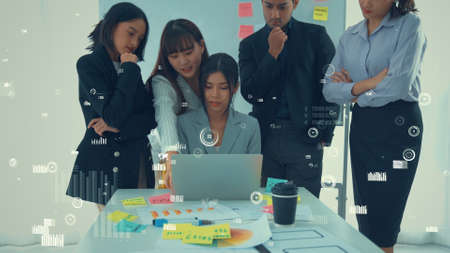 Business people in corporate staff meeting with envisional graphic . Concept of digital technology for marketing data analysis and investment decision making .の写真素材