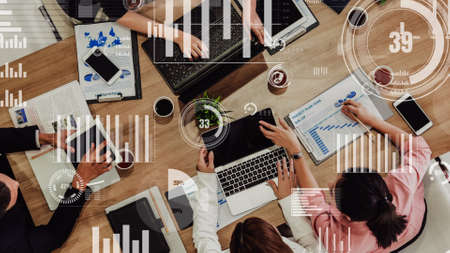 Conceptual vision of business people in the corporate staff meeting . Concept of digital technology for marketing data analysis and investment decision making .の写真素材