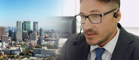 Business people wearing headset working in office to support remote customer or colleague. Call...