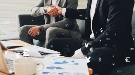 Conceptual business handshake with dashboard for financial data analysis . 3D render computer graphic .の写真素材