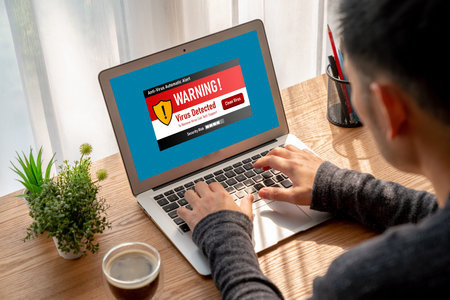 Virus warning alert on computer screen detected modish cyber threat , hacker, computer virus and...